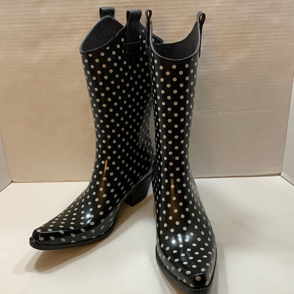 OCCASIONALLY MADE RAIN/MUD BOOTS IN Black and white polkadot. Size 9